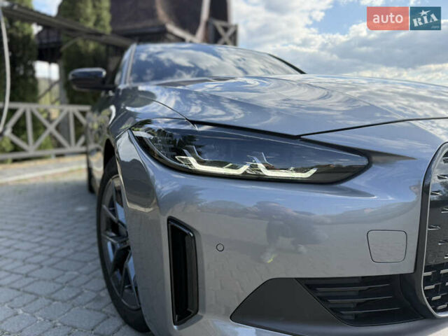 Серый БМВ i4, объемом двигателя 0 л и пробегом 26 тыс. км за 41499 $, фото 29 на Automoto.ua