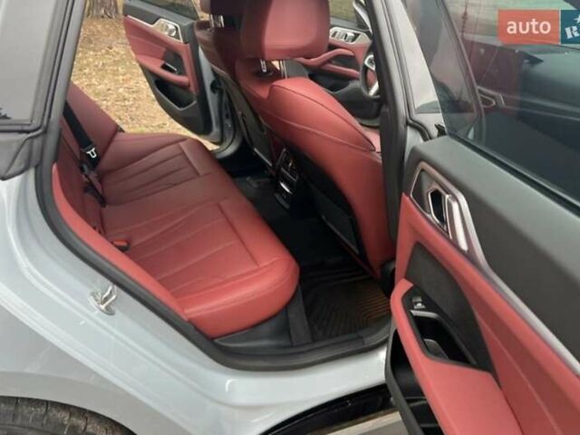 Серый БМВ i4, объемом двигателя 0 л и пробегом 15 тыс. км за 35777 $, фото 1 на Automoto.ua