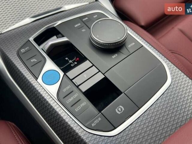 Серый БМВ i4, объемом двигателя 0 л и пробегом 15 тыс. км за 35777 $, фото 3 на Automoto.ua