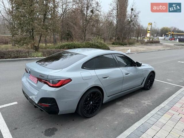 Серый БМВ i4, объемом двигателя 0 л и пробегом 30 тыс. км за 43000 $, фото 2 на Automoto.ua