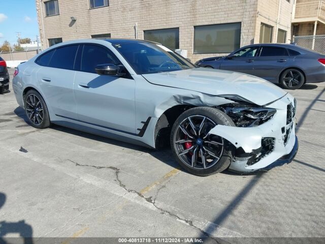 Серый БМВ i4, объемом двигателя 0 л и пробегом 10 тыс. км за 36900 $, фото 2 на Automoto.ua