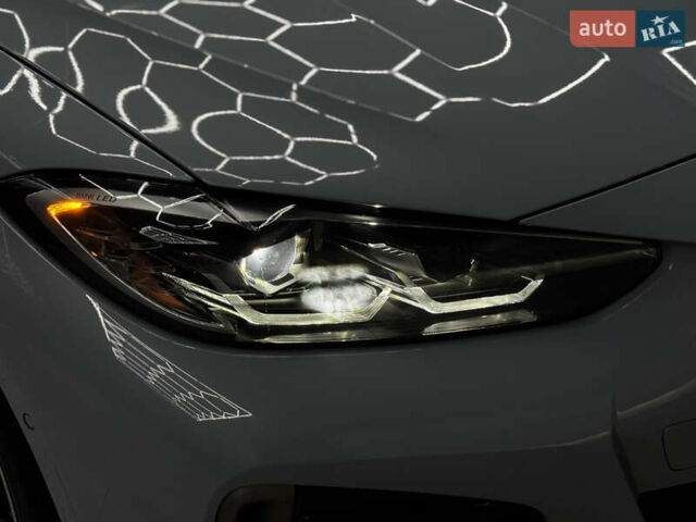Серый БМВ i4, объемом двигателя 0 л и пробегом 25 тыс. км за 47500 $, фото 12 на Automoto.ua