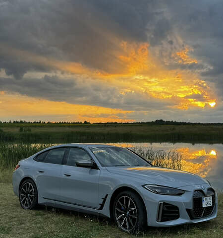 Серый БМВ i4, объемом двигателя 0 л и пробегом 25 тыс. км за 44600 $, фото 2 на Automoto.ua