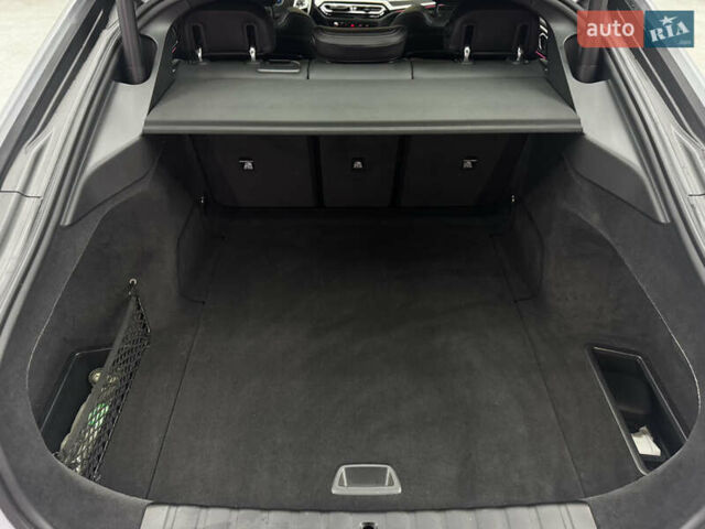 Серый БМВ i4, объемом двигателя 0 л и пробегом 25 тыс. км за 47500 $, фото 54 на Automoto.ua