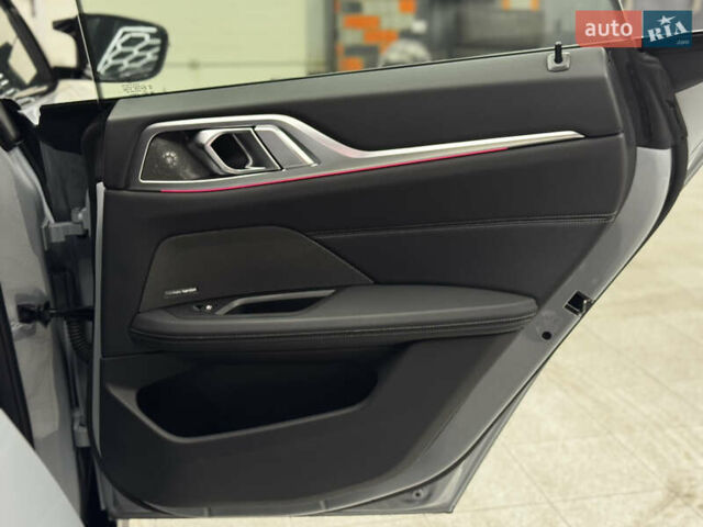 Серый БМВ i4, объемом двигателя 0 л и пробегом 25 тыс. км за 47500 $, фото 62 на Automoto.ua