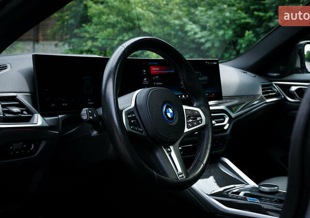 Серый БМВ i4, объемом двигателя 0 л и пробегом 25 тыс. км за 44600 $, фото 21 на Automoto.ua