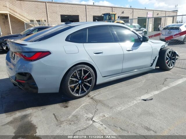 Серый БМВ i4, объемом двигателя 0 л и пробегом 10 тыс. км за 36900 $, фото 5 на Automoto.ua