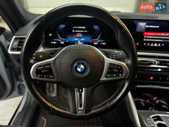 Серый БМВ i4, объемом двигателя 0 л и пробегом 25 тыс. км за 47500 $, фото 34 на Automoto.ua