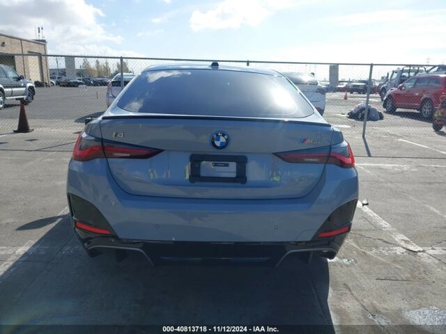 Серый БМВ i4, объемом двигателя 0 л и пробегом 10 тыс. км за 36900 $, фото 4 на Automoto.ua