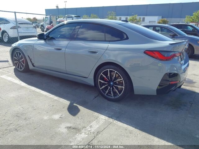 Серый БМВ i4, объемом двигателя 0 л и пробегом 10 тыс. км за 36900 $, фото 3 на Automoto.ua