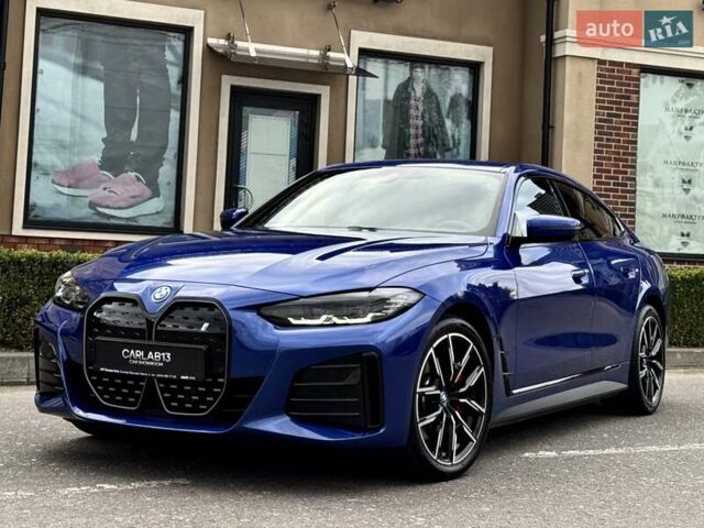 Синий БМВ i4, объемом двигателя 0 л и пробегом 16 тыс. км за 42500 $, фото 1 на Automoto.ua