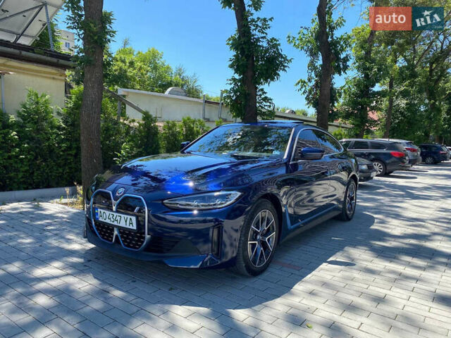 Синий БМВ i4, объемом двигателя 0 л и пробегом 22 тыс. км за 44990 $, фото 1 на Automoto.ua