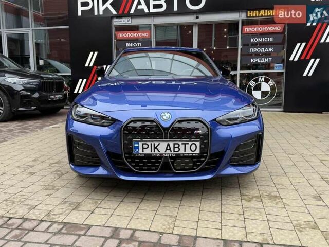 Синий БМВ i4, объемом двигателя 0 л и пробегом 23 тыс. км за 44900 $, фото 2 на Automoto.ua