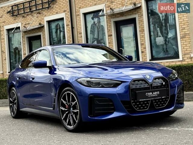 Синий БМВ i4, объемом двигателя 0 л и пробегом 16 тыс. км за 42500 $, фото 4 на Automoto.ua