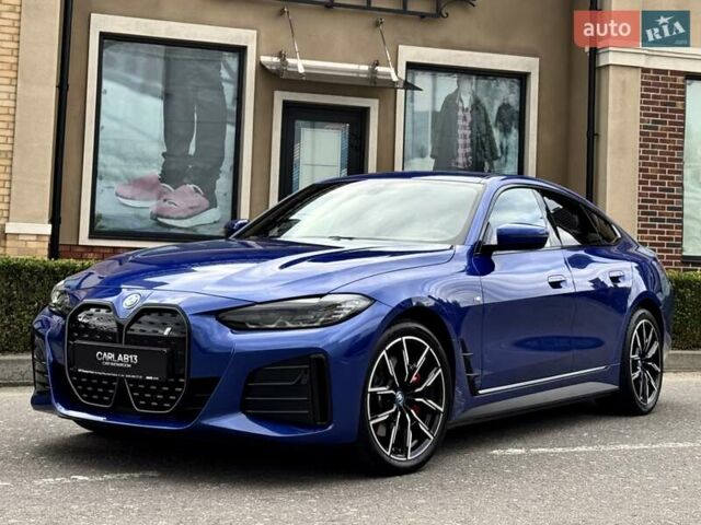 Синий БМВ i4, объемом двигателя 0 л и пробегом 16 тыс. км за 42500 $, фото 2 на Automoto.ua