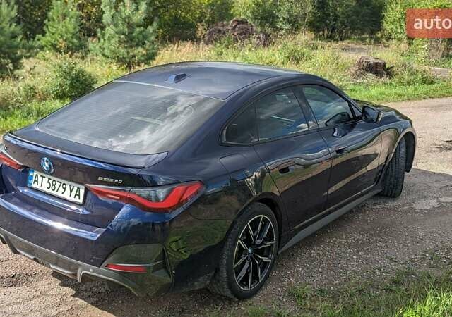 Синий БМВ i4, объемом двигателя 0 л и пробегом 44 тыс. км за 36350 $, фото 44 на Automoto.ua