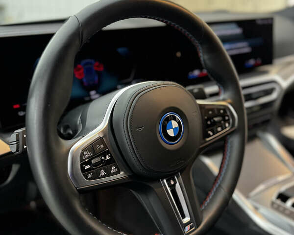 Синий БМВ i4, объемом двигателя 0 л и пробегом 54 тыс. км за 44500 $, фото 9 на Automoto.ua