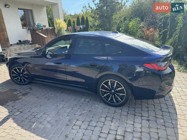 Синий БМВ i4, объемом двигателя 0 л и пробегом 44 тыс. км за 36350 $, фото 39 на Automoto.ua