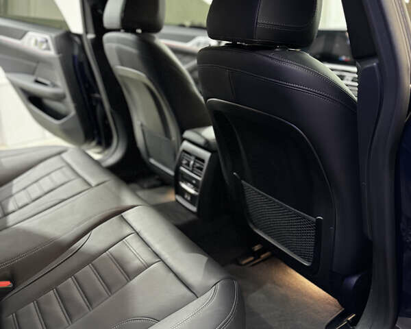 Синий БМВ i4, объемом двигателя 0 л и пробегом 54 тыс. км за 44500 $, фото 12 на Automoto.ua