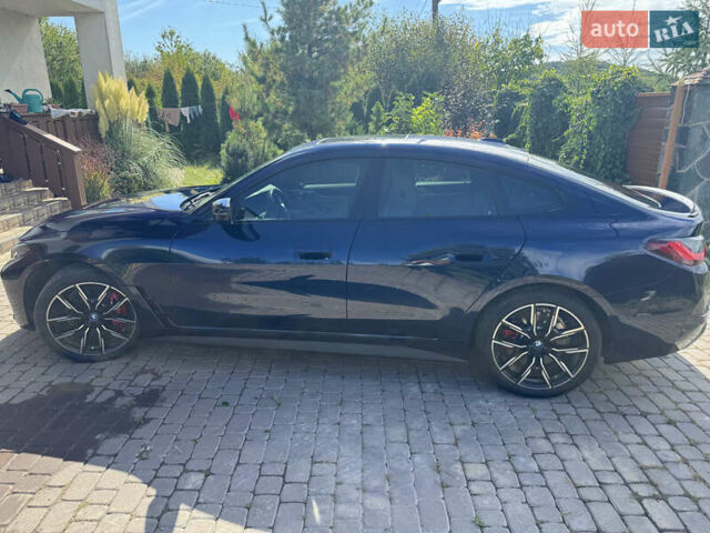 Синий БМВ i4, объемом двигателя 0 л и пробегом 44 тыс. км за 36350 $, фото 38 на Automoto.ua