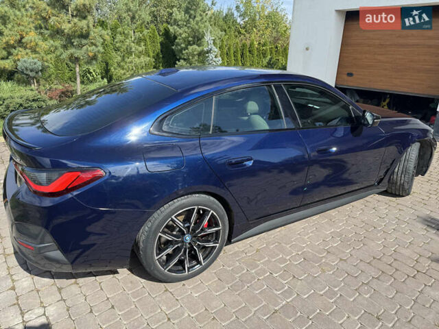Синий БМВ i4, объемом двигателя 0 л и пробегом 44 тыс. км за 36350 $, фото 24 на Automoto.ua