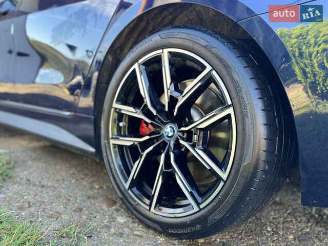 Синий БМВ i4, объемом двигателя 0 л и пробегом 44 тыс. км за 36350 $, фото 3 на Automoto.ua