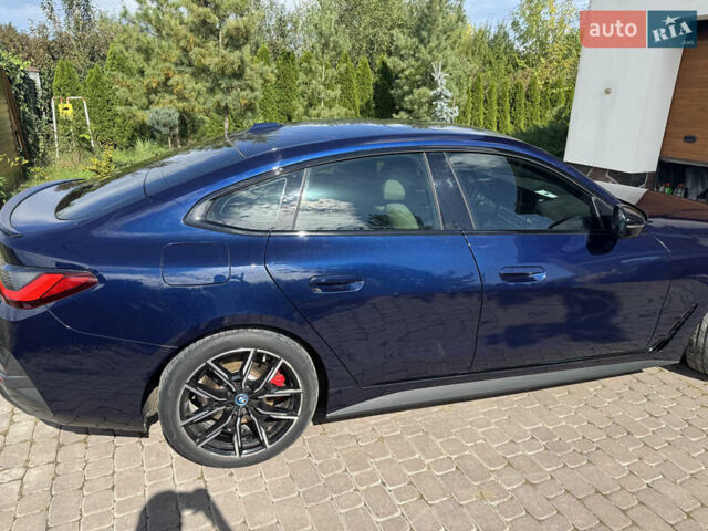 Синий БМВ i4, объемом двигателя 0 л и пробегом 44 тыс. км за 36350 $, фото 26 на Automoto.ua