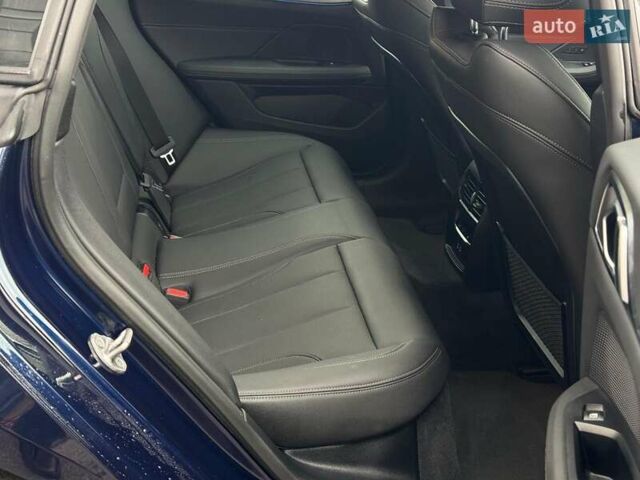 Синий БМВ i4, объемом двигателя 0 л и пробегом 16 тыс. км за 32990 $, фото 24 на Automoto.ua