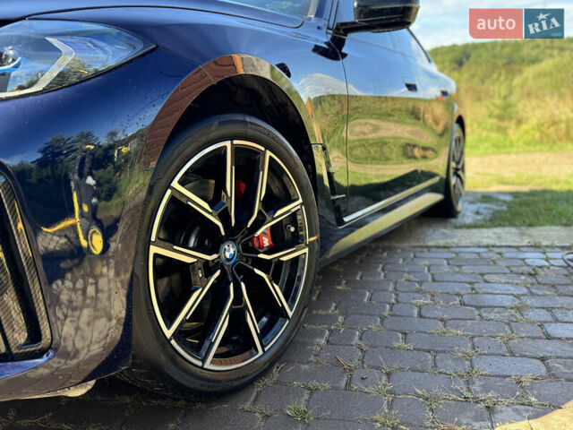 Синий БМВ i4, объемом двигателя 0 л и пробегом 44 тыс. км за 36350 $, фото 2 на Automoto.ua