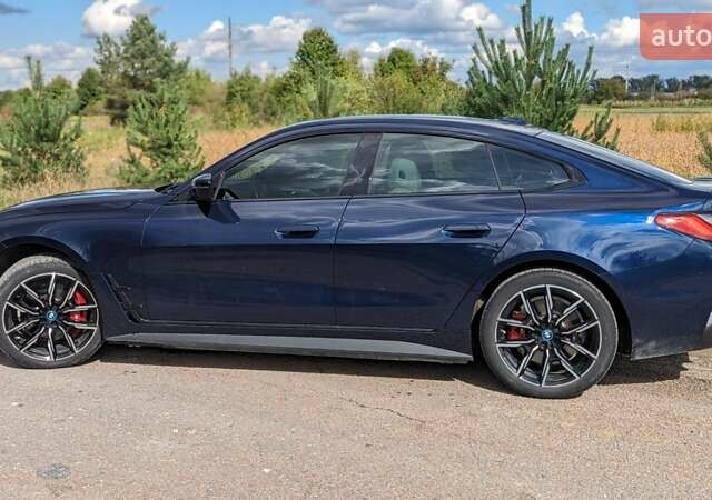 Синий БМВ i4, объемом двигателя 0 л и пробегом 44 тыс. км за 36350 $, фото 41 на Automoto.ua