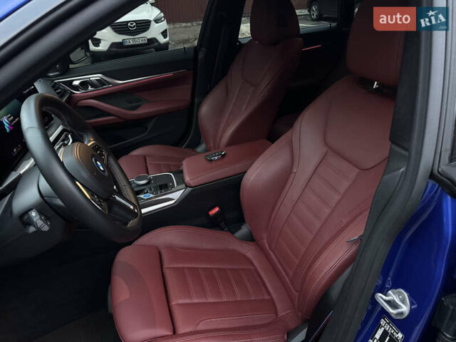 Синий БМВ i4, объемом двигателя 0 л и пробегом 10 тыс. км за 60000 $, фото 1 на Automoto.ua