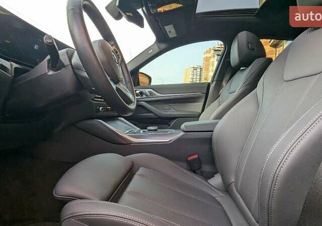 Зеленый БМВ i4, объемом двигателя 0 л и пробегом 5 тыс. км за 48499 $, фото 4 на Automoto.ua