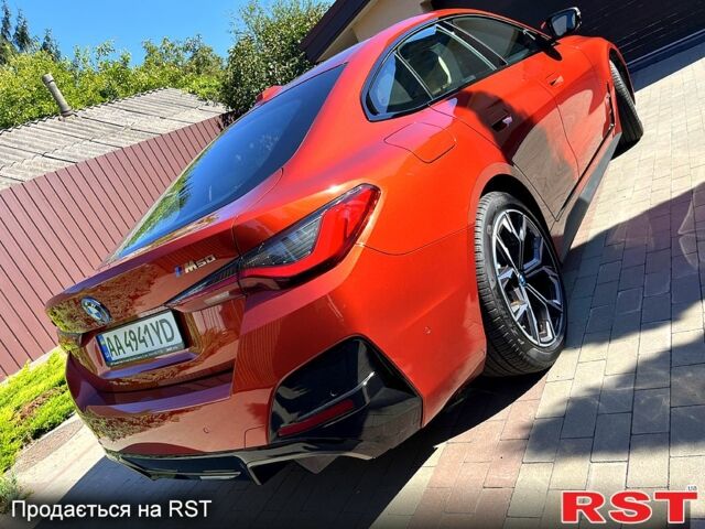 Оранжевый БМВ i4, объемом двигателя 0.4 л и пробегом 900 тыс. км за 54000 $, фото 2 на Automoto.ua