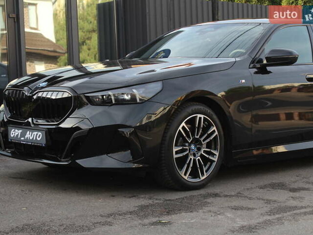 Черный БМВ i5, объемом двигателя 0 л и пробегом 1 тыс. км за 69700 $, фото 1 на Automoto.ua