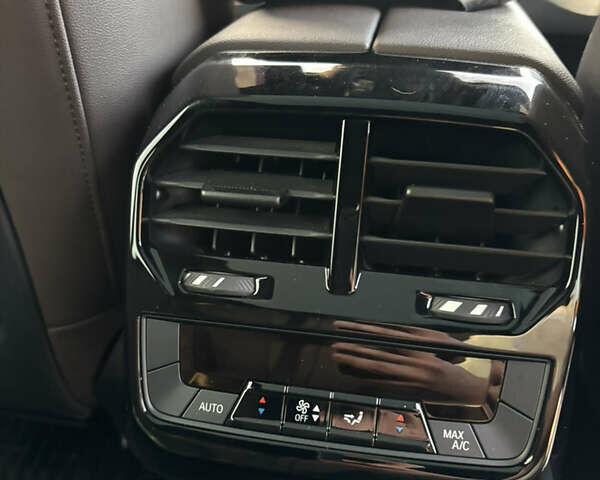 Белый БМВ iX, объемом двигателя 0 л и пробегом 57 тыс. км за 56700 $, фото 25 на Automoto.ua