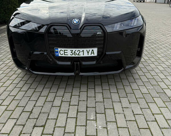 Черный БМВ iX, объемом двигателя 0 л и пробегом 40 тыс. км за 61088 $, фото 11 на Automoto.ua