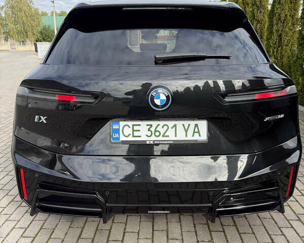Черный БМВ iX, объемом двигателя 0 л и пробегом 40 тыс. км за 61088 $, фото 12 на Automoto.ua