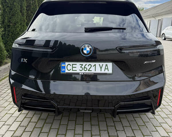 Черный БМВ iX, объемом двигателя 0 л и пробегом 40 тыс. км за 61088 $, фото 4 на Automoto.ua