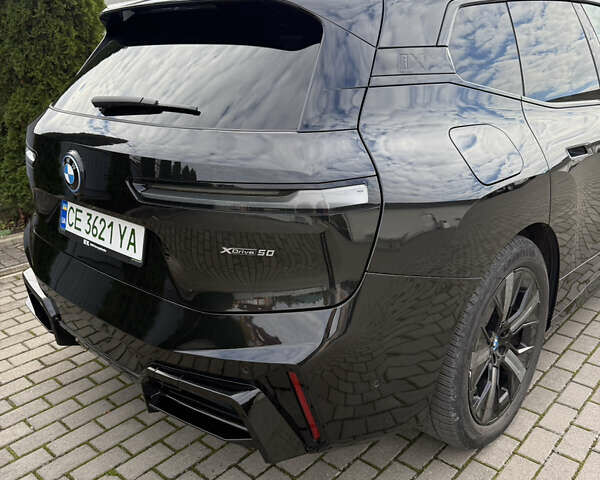 Черный БМВ iX, объемом двигателя 0 л и пробегом 40 тыс. км за 61088 $, фото 3 на Automoto.ua