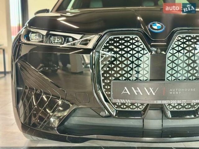 Черный БМВ iX, объемом двигателя 0 л и пробегом 62 тыс. км за 60390 $, фото 2 на Automoto.ua