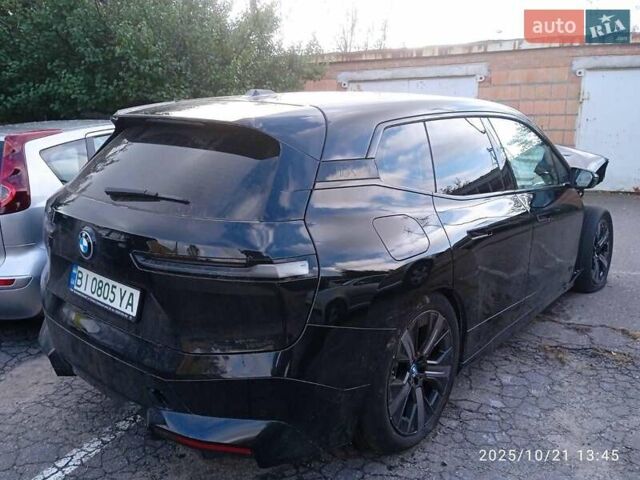 Черный БМВ iX, объемом двигателя 0 л и пробегом 25 тыс. км за 31500 $, фото 1 на Automoto.ua