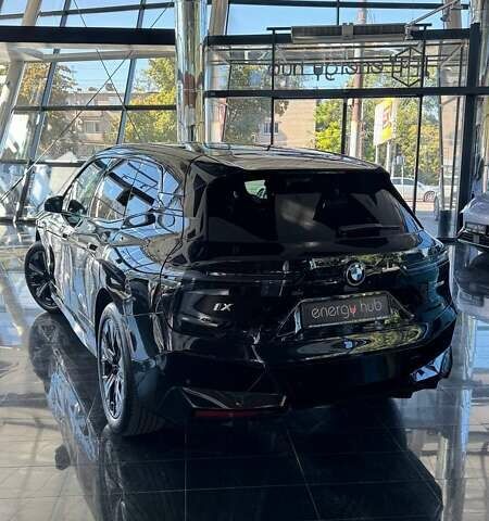 Черный БМВ iX, объемом двигателя 0 л и пробегом 1 тыс. км за 69000 $, фото 2 на Automoto.ua