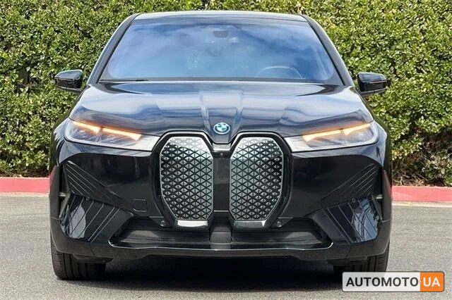 Черный БМВ iX, объемом двигателя 0 л и пробегом 0 тыс. км за 78200 $, фото 1 на Automoto.ua