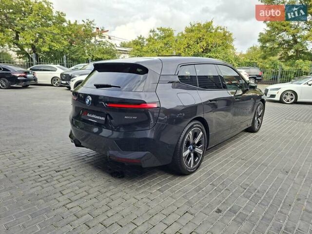 Серый БМВ iX, объемом двигателя 0 л и пробегом 20 тыс. км за 52900 $, фото 4 на Automoto.ua