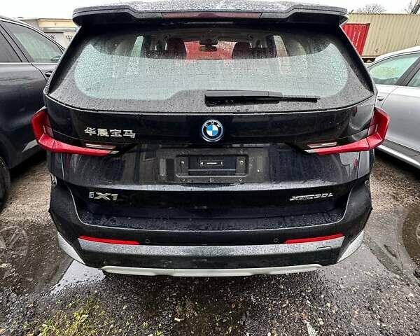 Черный БМВ iX1, объемом двигателя 0 л и пробегом 28 тыс. км за 28500 $, фото 6 на Automoto.ua