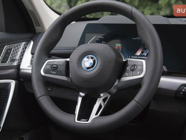купить новое авто БМВ iX1 2025 года от официального дилера E-MOTION CARS БМВ фото