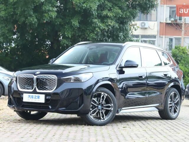 купить новое авто БМВ iX1 2025 года от официального дилера E-MOTION CARS БМВ фото