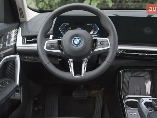 купить новое авто БМВ iX1 2025 года от официального дилера E-MOTION CARS БМВ фото