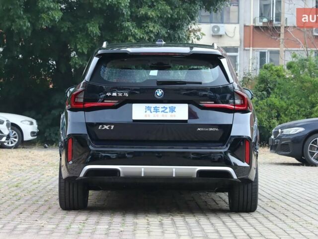 купить новое авто БМВ iX1 2025 года от официального дилера E-MOTION CARS БМВ фото