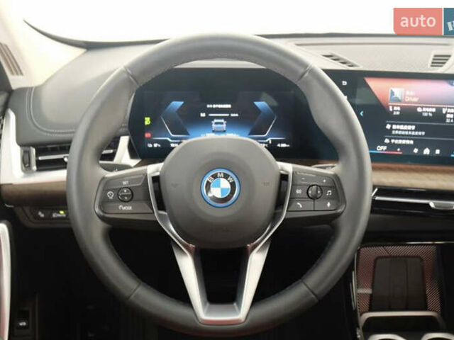 Синий БМВ iX1, объемом двигателя 0 л и пробегом 7 тыс. км за 25999 $, фото 8 на Automoto.ua